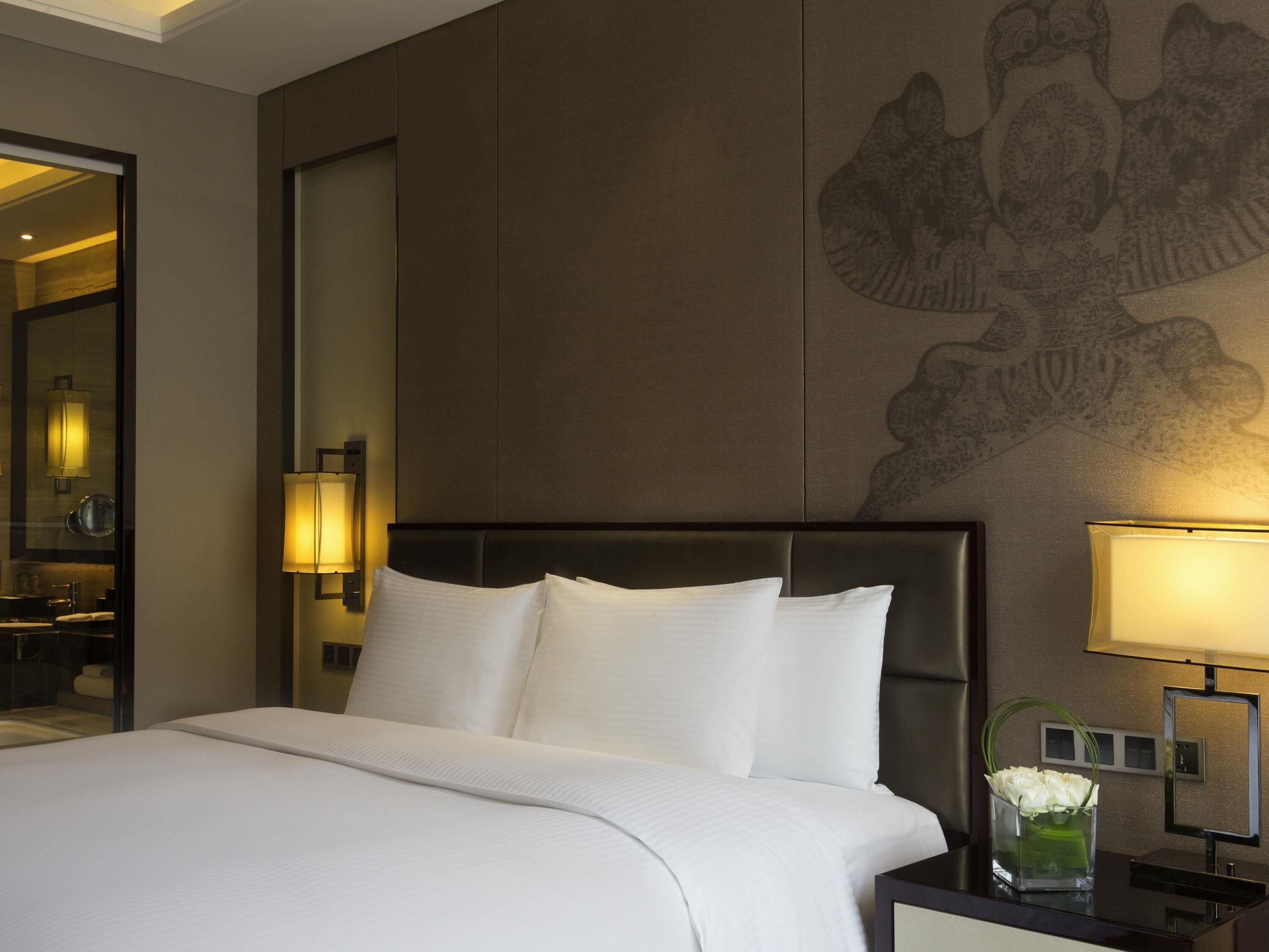 Ropa de cama de alta calidad y minibar 