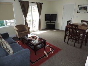 Suite, 2 Bedrooms | Living area | 32-inch flat-screen TV with cable channels, TV - The Bayshore Waterfront Inn (Ucluelet)