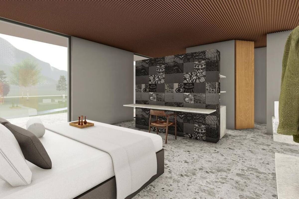 A modern bedroom with a bed, a desk, and a chair. There is a large window providing a view of the outdoors.