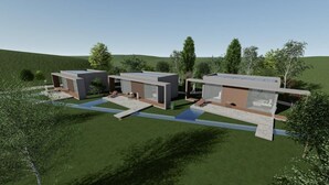 A modern architectural design with three separate buildings, each with distinct entrances and outdoor seating areas. - Casa Arrigo (Linguaglossa)