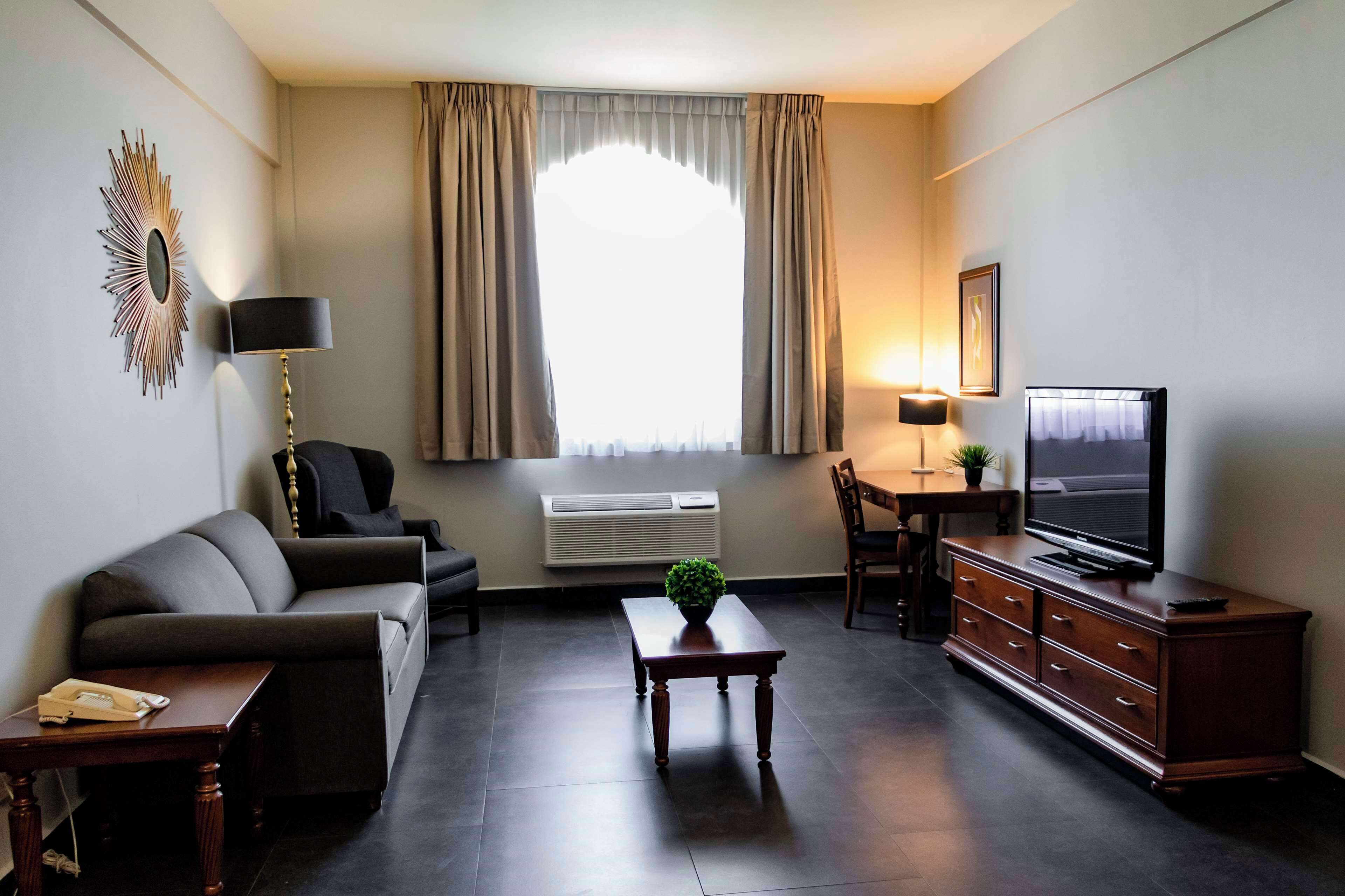 in-room safe, desk, blackout curtains, iron/ironing board