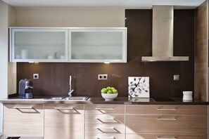 Apartment, 1 Bedroom (3-4 adults) | Private kitchen | Full-size fridge, microwave, stovetop, dishwasher