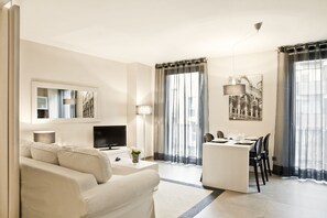 Apartment, 1 Bedroom (3-4 adults) | Living room | 32-inch LCD TV with digital channels, TV - Up Suites Bcn (Barcelona)