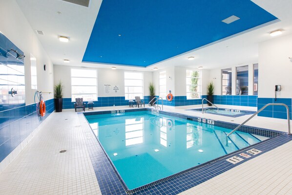 Indoor pool, open 5:30 AM to 10:00 PM, pool loungers