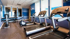 A gym with treadmills, dumbbells, and a weight bench. - Holiday Inn Express & Suites Spruce Grove - Stony Plain by IHG (Spruce Grove)