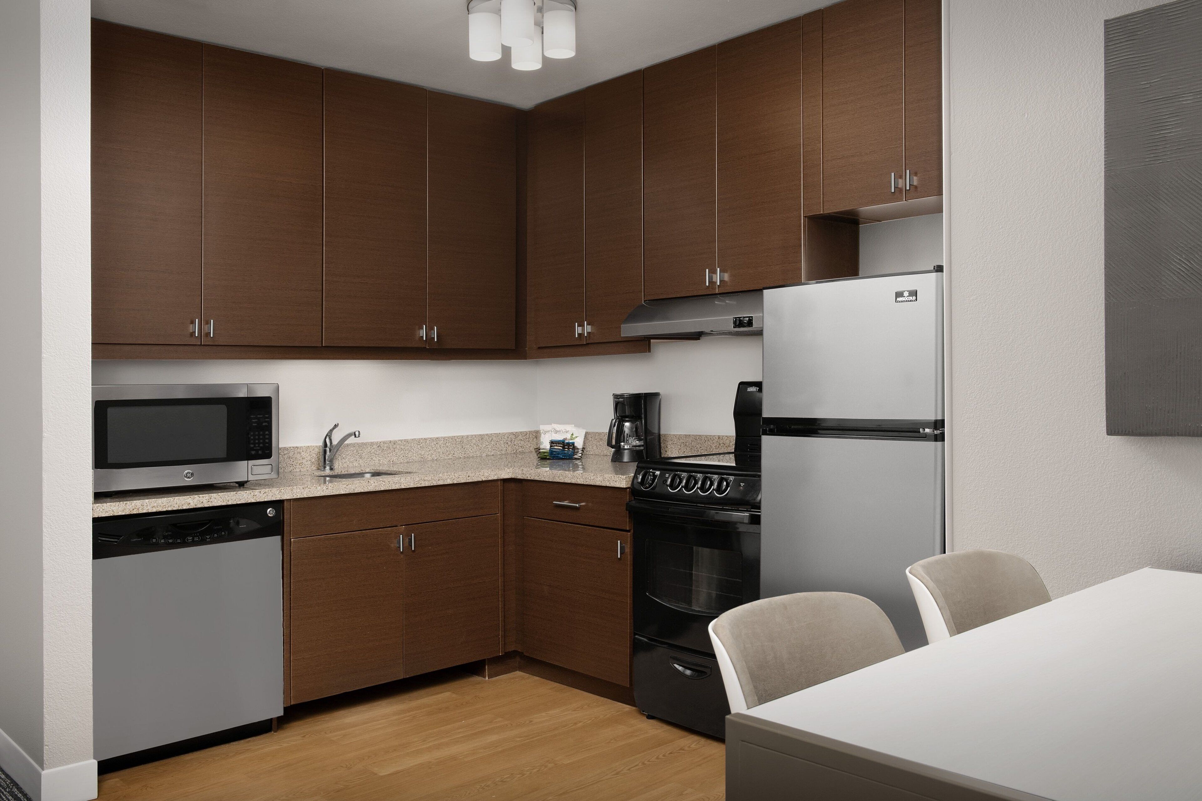 suite, 2 bedrooms | private kitchen | fridge, microwave, stovetop, dishwasher