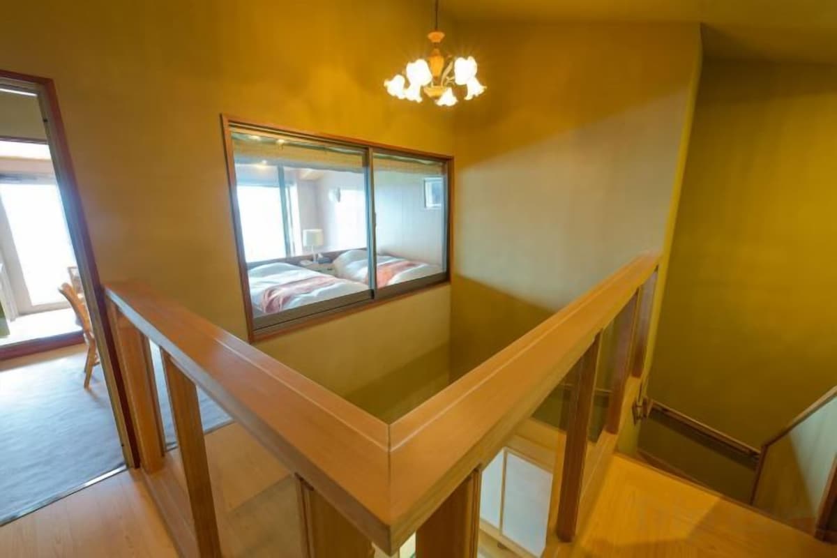Minibar, desk, bed sheets