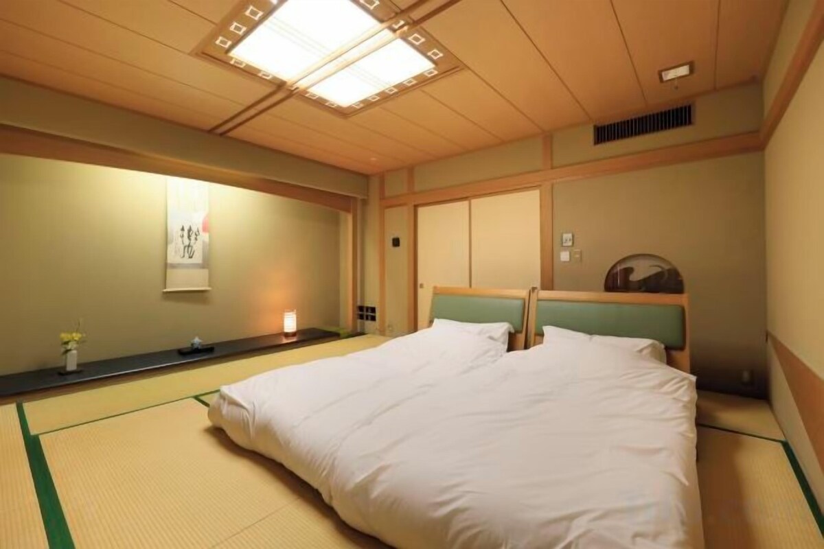 Minibar, desk, bed sheets