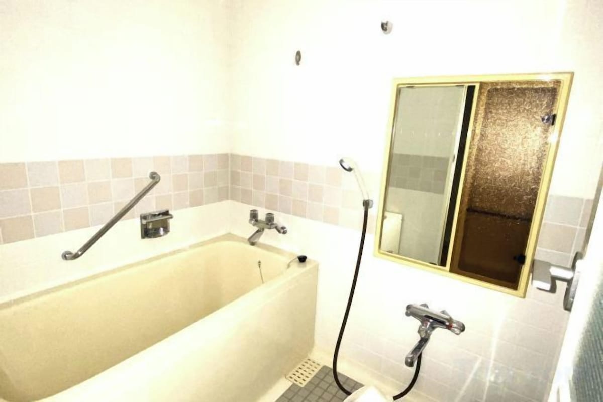 Bathroom | Deep soaking tub, free toiletries, hair dryer, bathrobes
