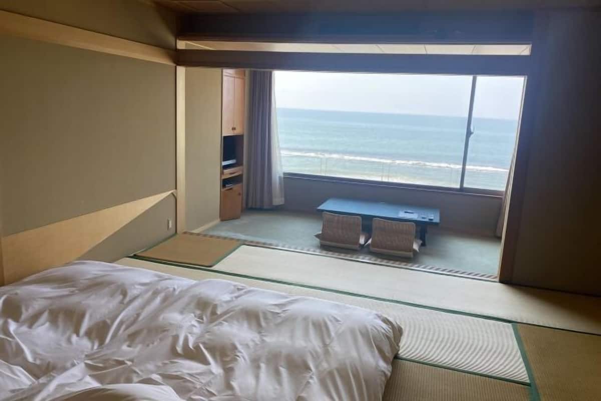 Minibar, desk, bed sheets