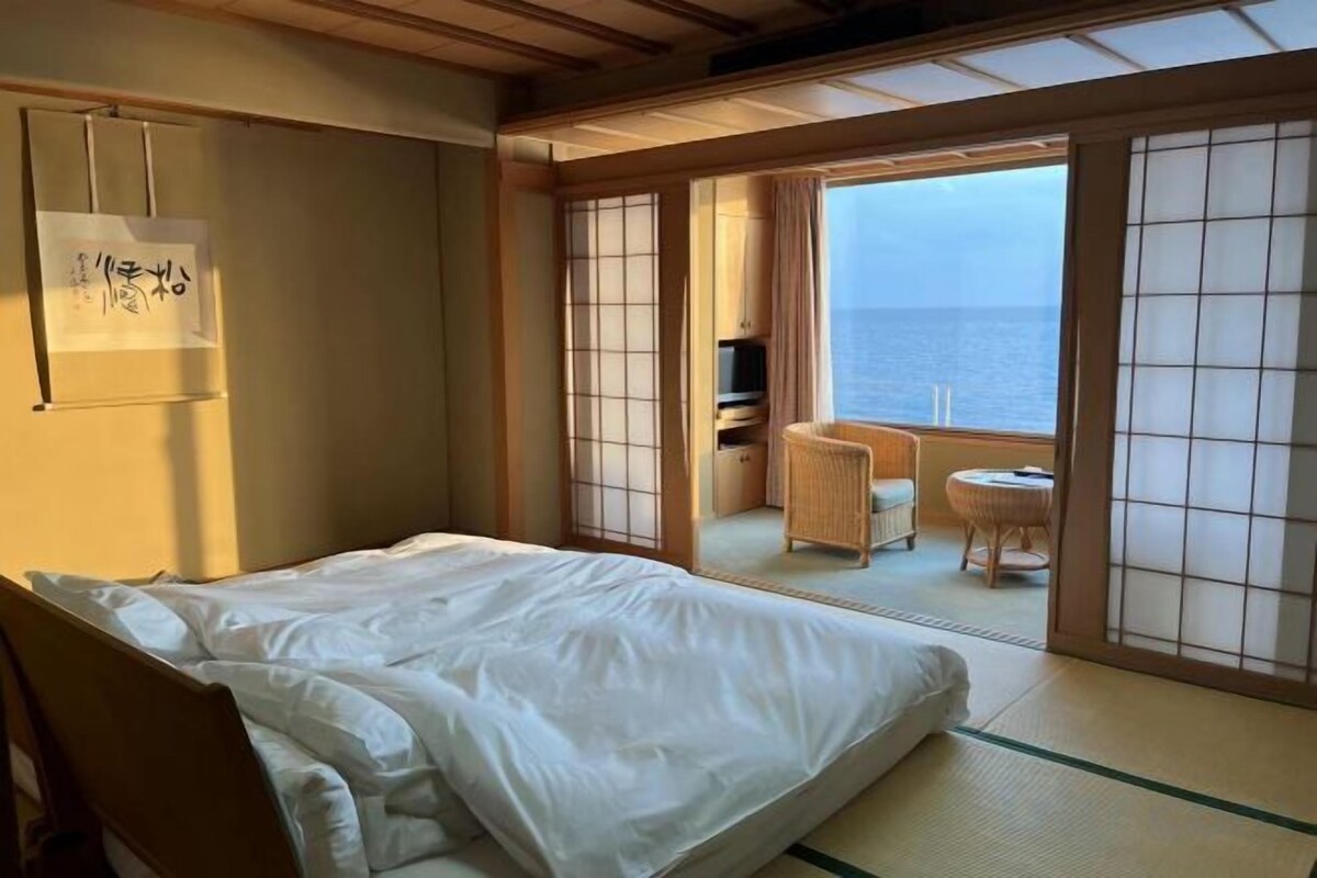 Minibar, desk, bed sheets