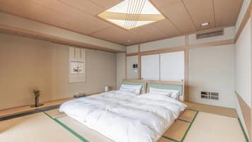 Minibar, desk, bed sheets