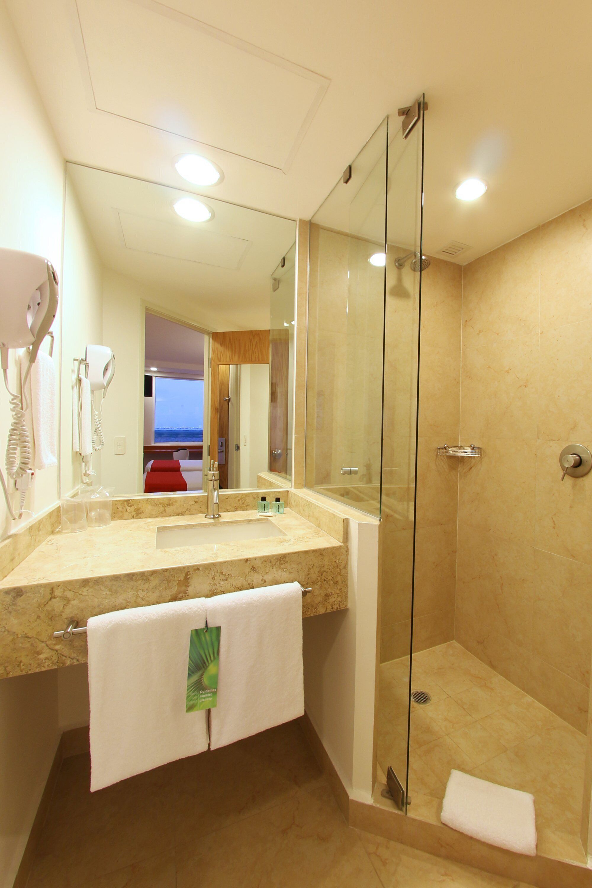 standard twin room, 2 single beds | bathroom | shower, eco-friendly toiletries, hair dryer, towels