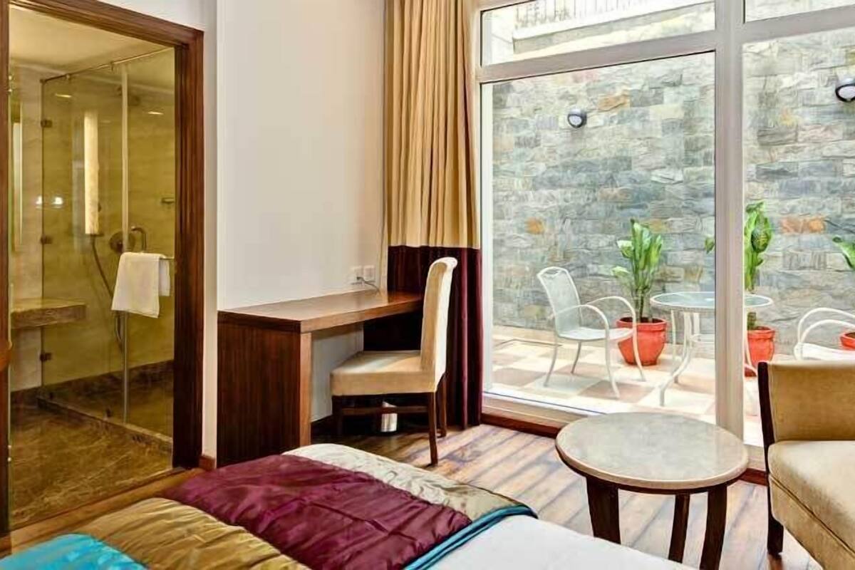 Chambre Premium | Coin séjour