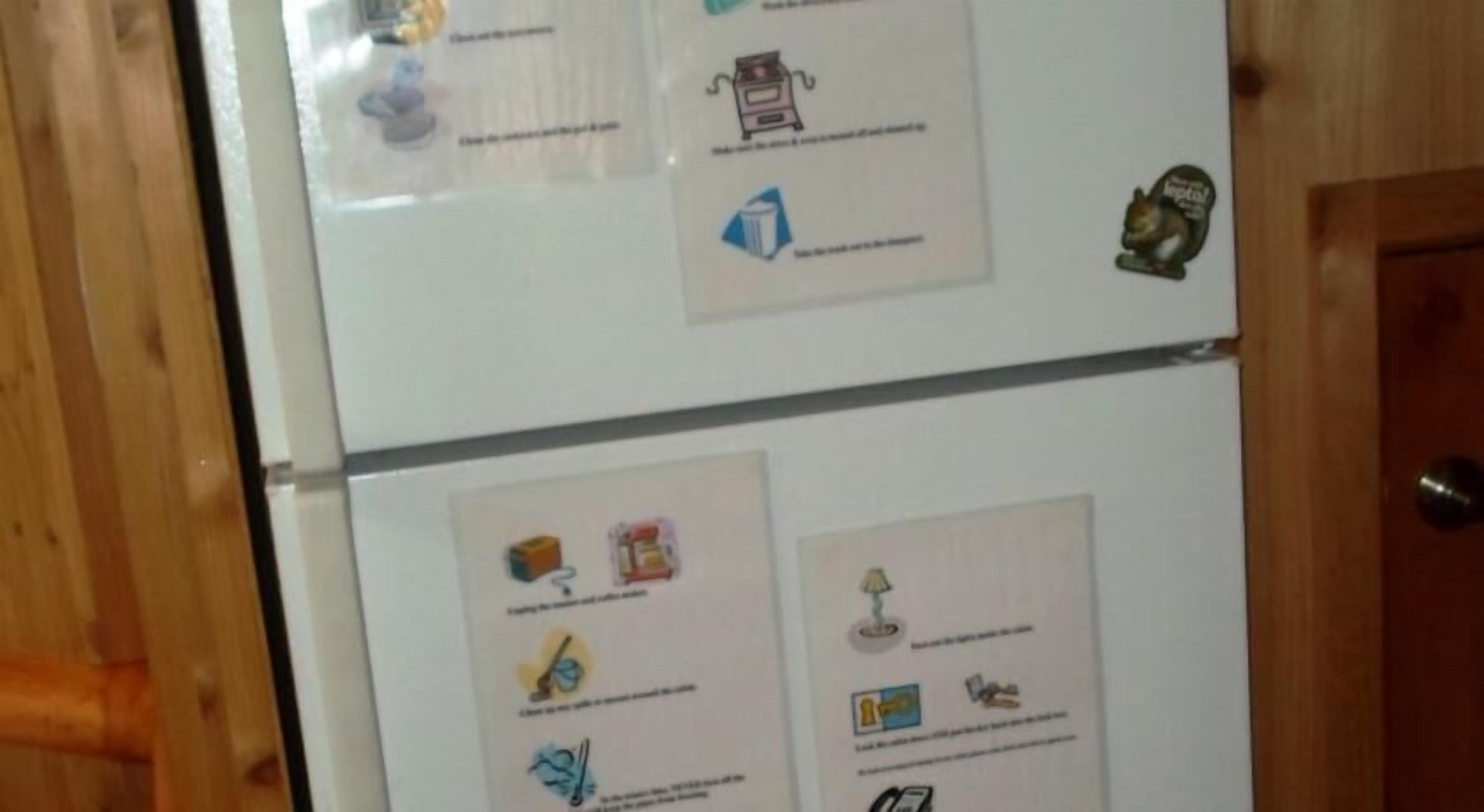 A refrigerator with magnets and notes on the door.