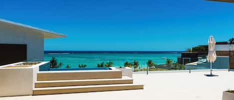 Outdoor pool, pool umbrellas, pool loungers