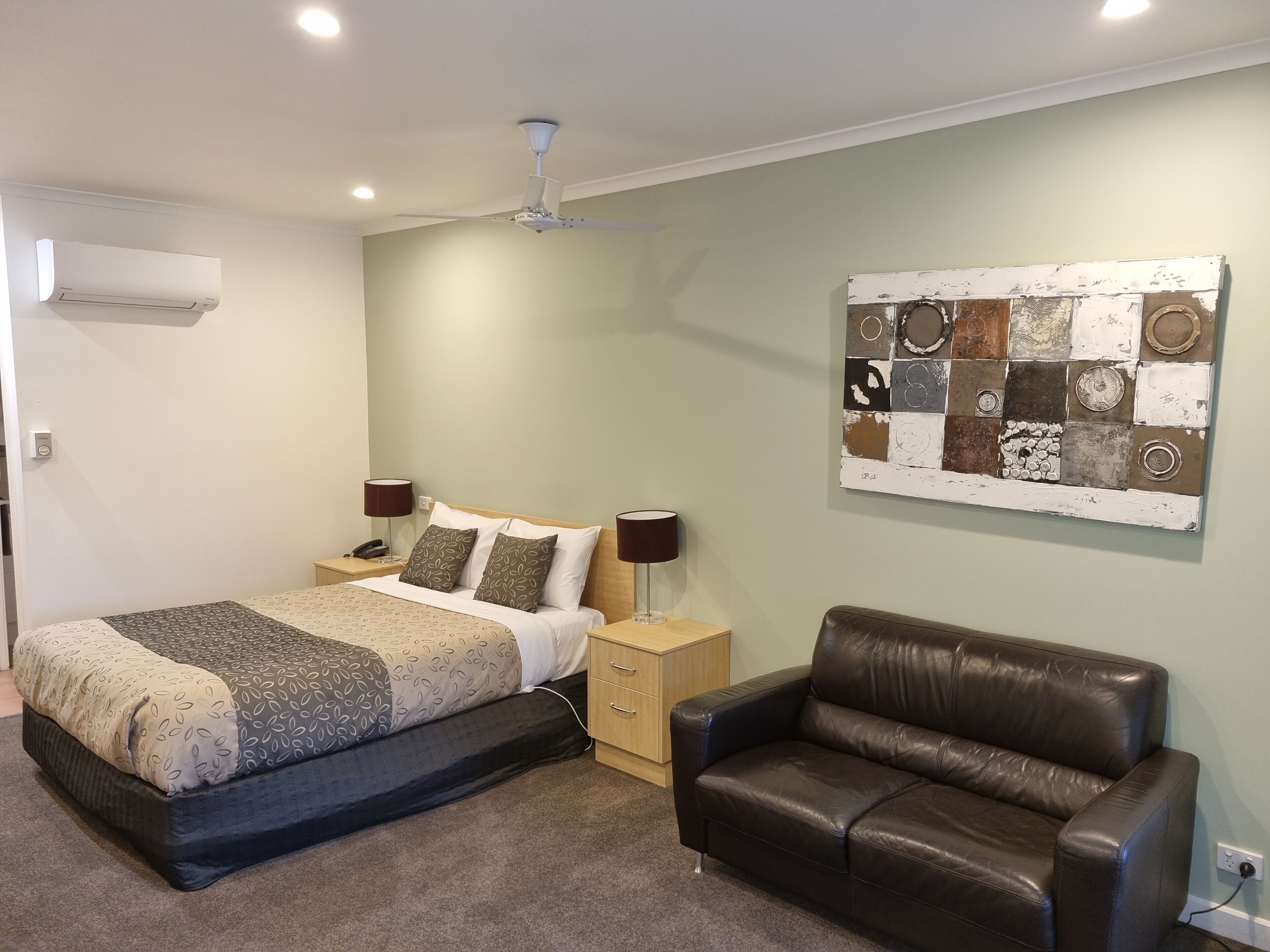 Premium bedding, laptop workspace, blackout drapes, iron/ironing board