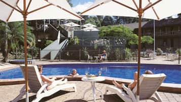 Outdoor pool, pool umbrellas, pool loungers