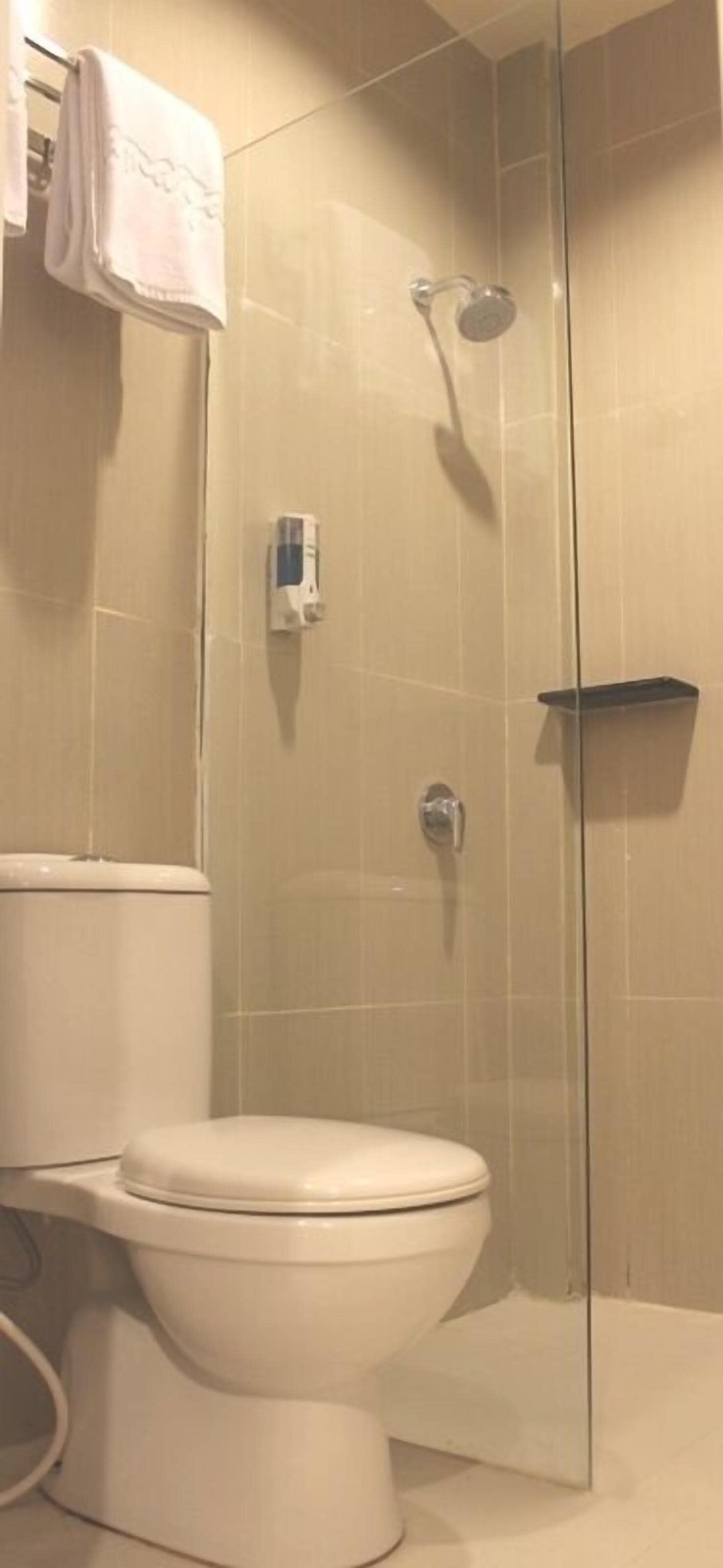 Bathroom | Shower, free toiletries, hair dryer, slippers