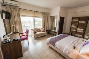 In-room safe, desk, blackout curtains, soundproofing - The Swiss Hotel (Freetown)