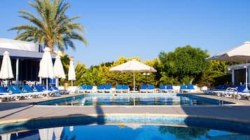 Seasonal outdoor pool, pool umbrellas, pool loungers