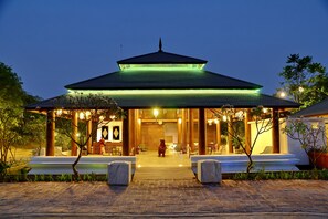 A traditional building with a green roof and a central entrance. - Zfreeti Hotel (Nyaung-U)