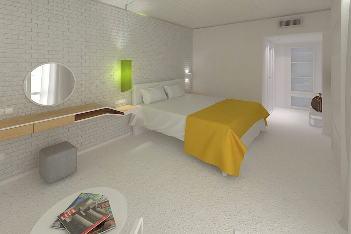 A modern bedroom with a bed, a bedside table, a mirror, and a wall-mounted light fixture.