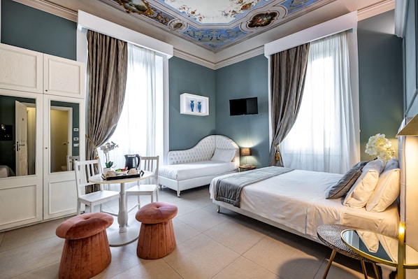Quadruple Room | Hypo-allergenic bedding, down comforters, minibar, in-room safe