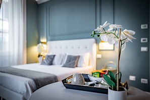 Quadruple Room | Allergitestet sengetøy, dundyner, minibar og safe på rommet