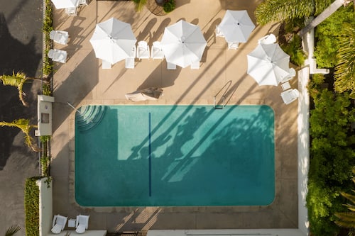 Outdoor pool, open 9 AM to 10 PM, pool umbrellas, sun loungers