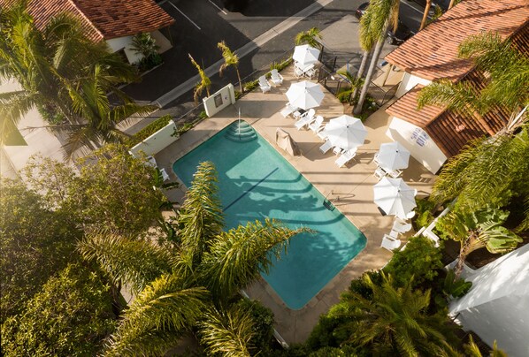 Outdoor pool, open 9 AM to 10 PM, pool umbrellas, sun loungers