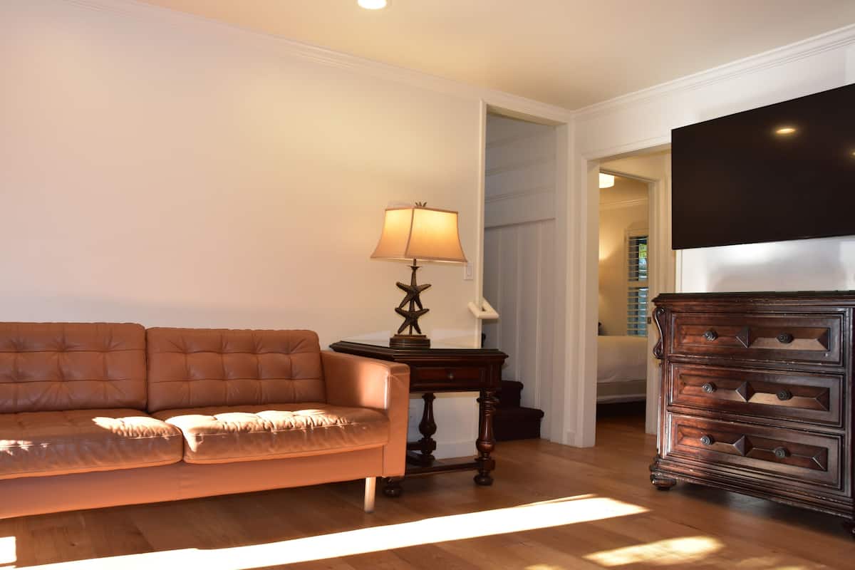 Family Suite, 2 Bedrooms | Living area | Flat-screen TV, DVD player, iPod dock