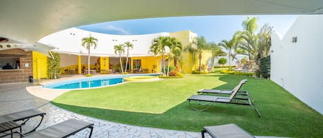 Outdoor pool, open 8 AM to 10 PM, pool umbrellas, sun loungers