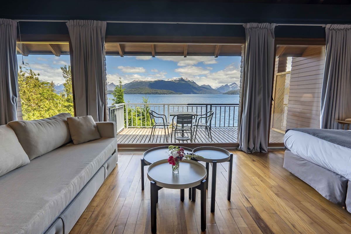 deluxe double room, lake view | down duvets, pillow-top beds, minibar, in-room safe