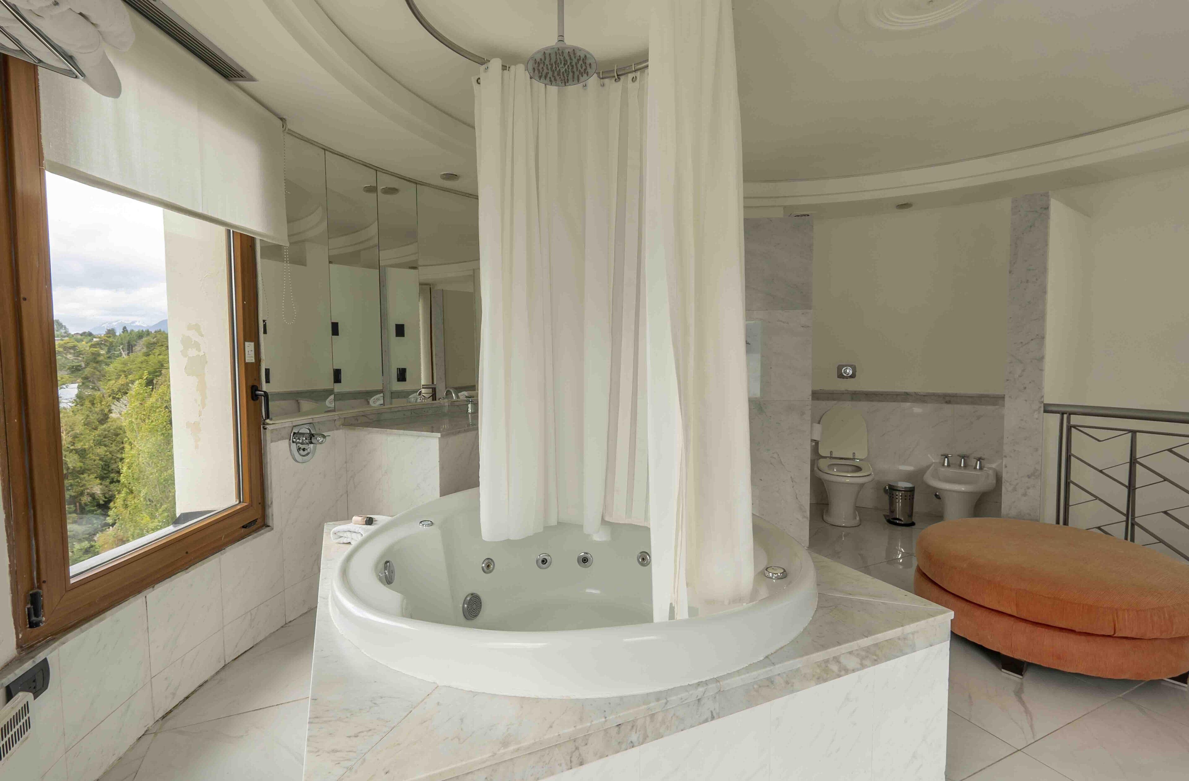 deluxe double room, lake view | down duvets, pillow-top beds, minibar, in-room safe