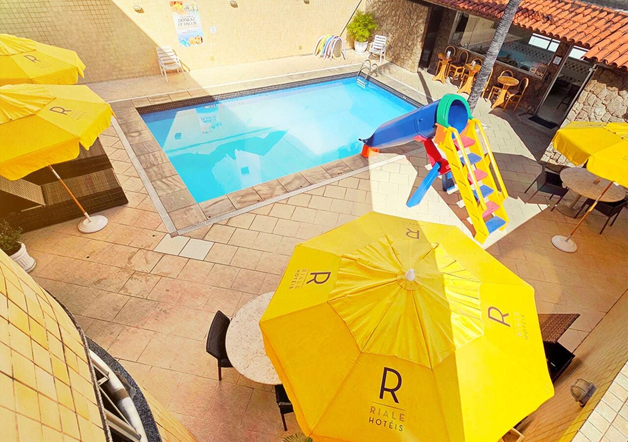 Outdoor pool, open 9:00 AM to 9:00 PM, pool umbrellas, sun loungers