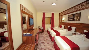 Premium bedding, in-room safe, iron/ironing board (on request)