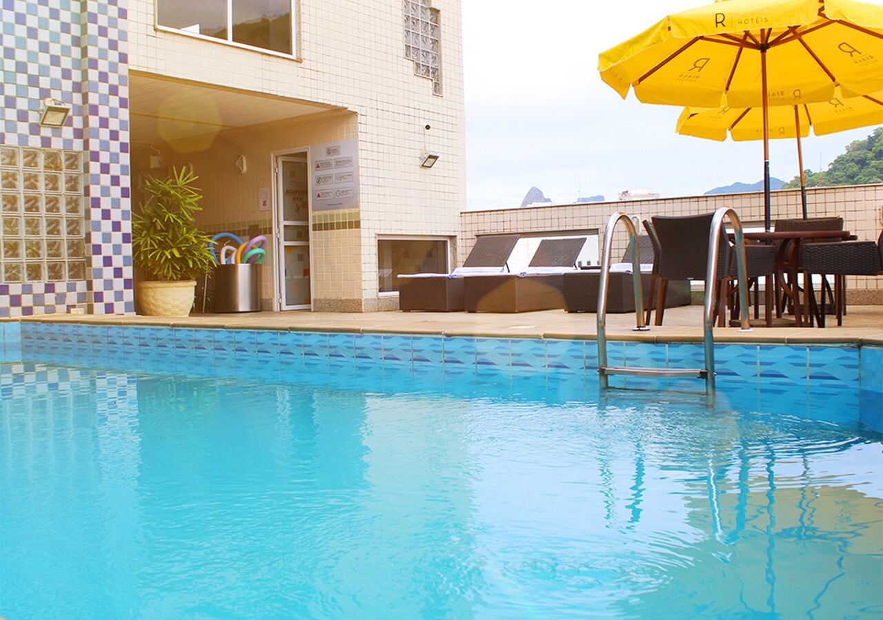 outdoor pool, pool umbrellas, pool loungers