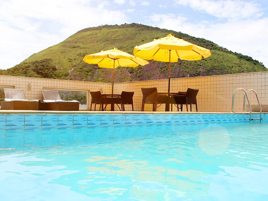 Outdoor pool, open 9:00 AM to 10:00 PM, pool umbrellas, sun loungers