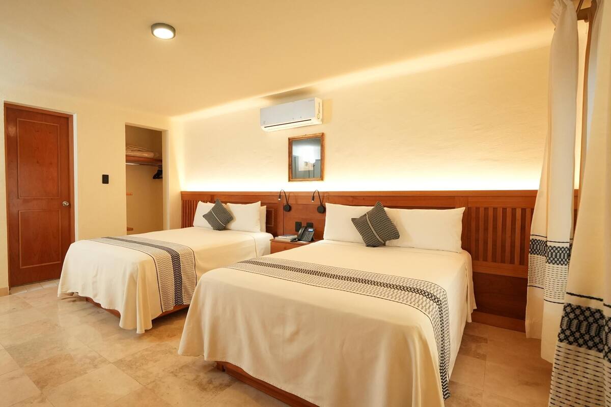 Cortinas blackout, cunas gratuitas, wifi gratis y ropa de cama 