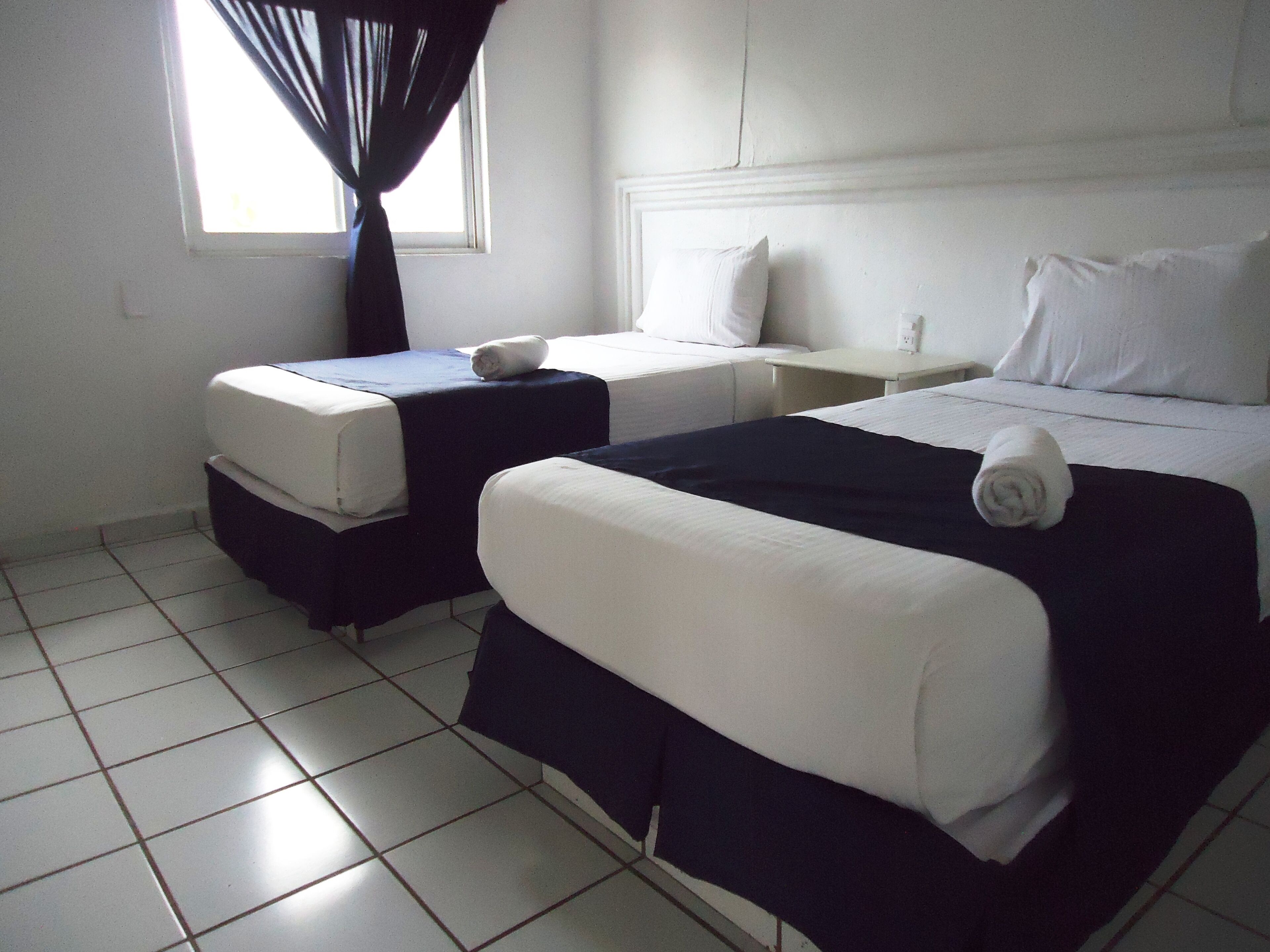 Suite familiar, 2 habitaciones | Tabla de planchar con plancha y wifi gratis 
