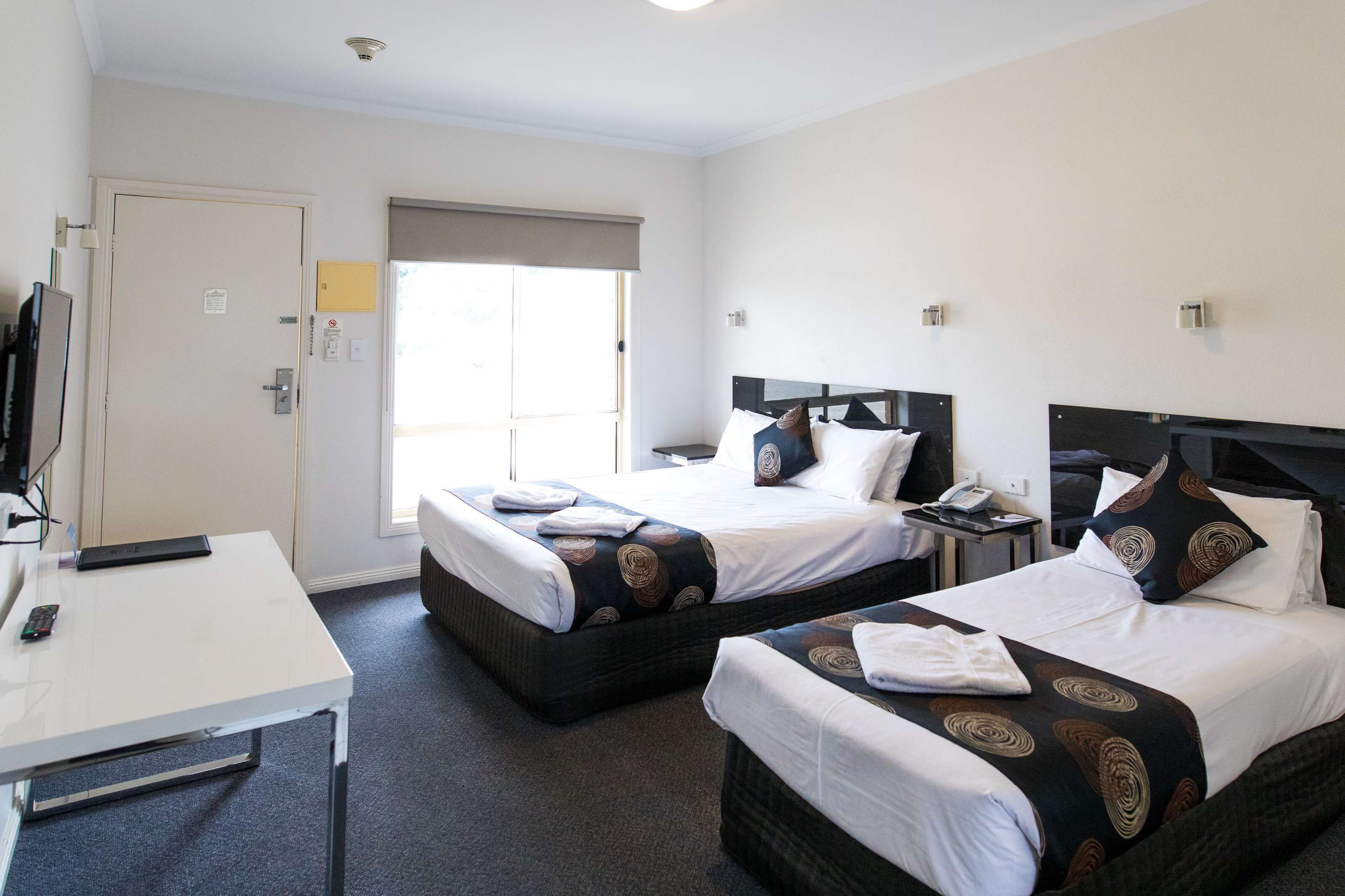 deluxe room, multiple beds, non smoking, kitchenette (walk-in shower) | desk, laptop workspace, blackout curtains, soundproofing