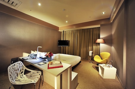 舒活時尚客房 | 高档床上用品、羽绒被、迷你吧、客房内保险箱