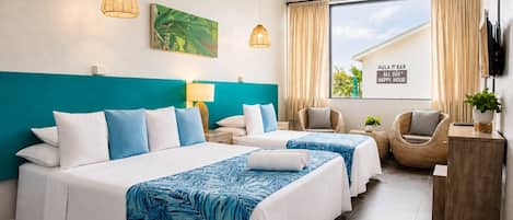 A hotel room with two beds, a large window, a TV, and a sign indicating all-day happy hours.