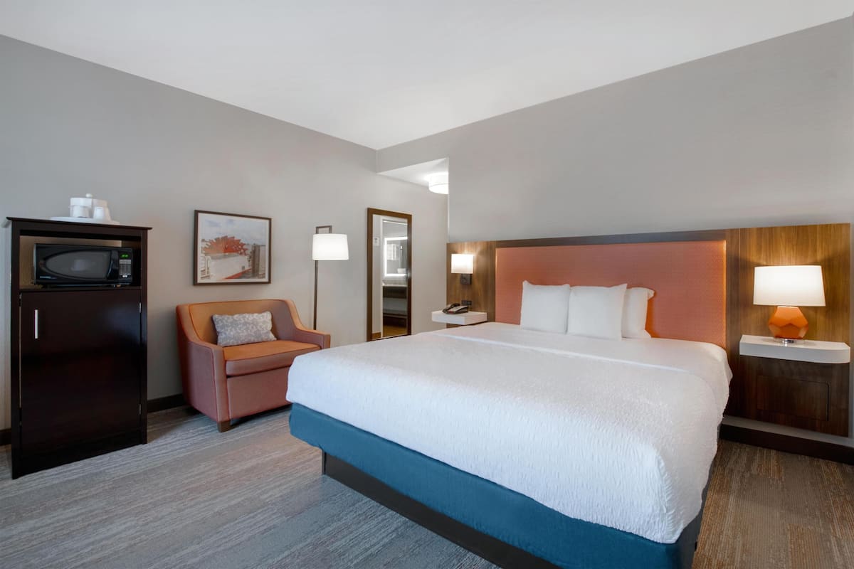 Room, 1 King Bed, Non Smoking | In-room safe, desk, laptop workspace, iron/ironing board