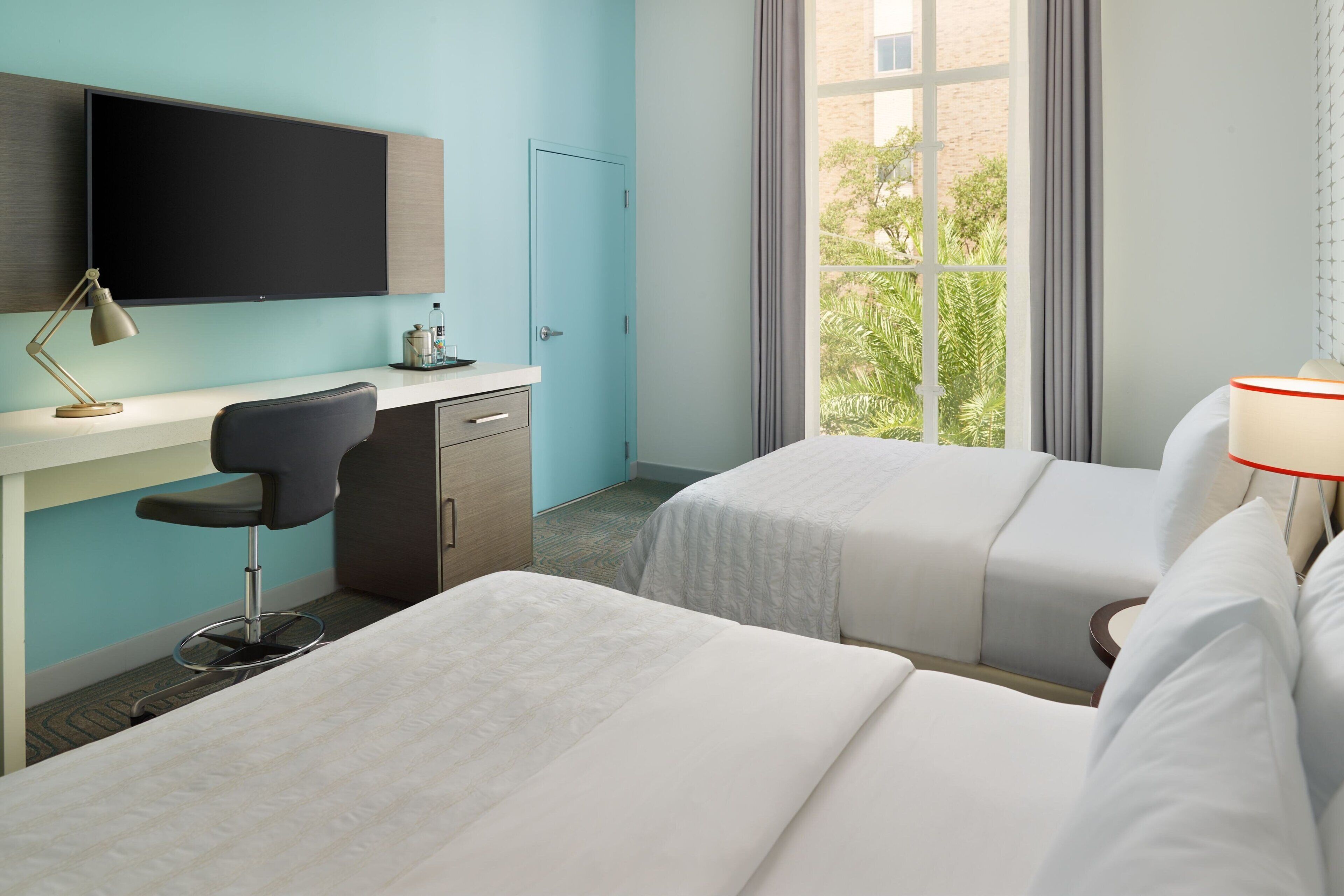 deluxe room, 2 queen beds | premium bedding, in-room safe, desk, iron/ironing board