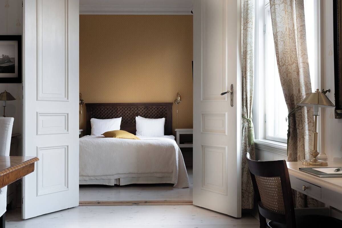 Suite  | Dundyner, minibar, skrivebord og blendingsgardiner
