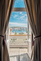 Double Room With View and Balcony | Down comforters, minibar, individually decorated, individually furnished