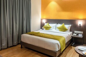In-room safe, desk, laptop workspace, soundproofing - La Sara Comforts (Bengaluru)