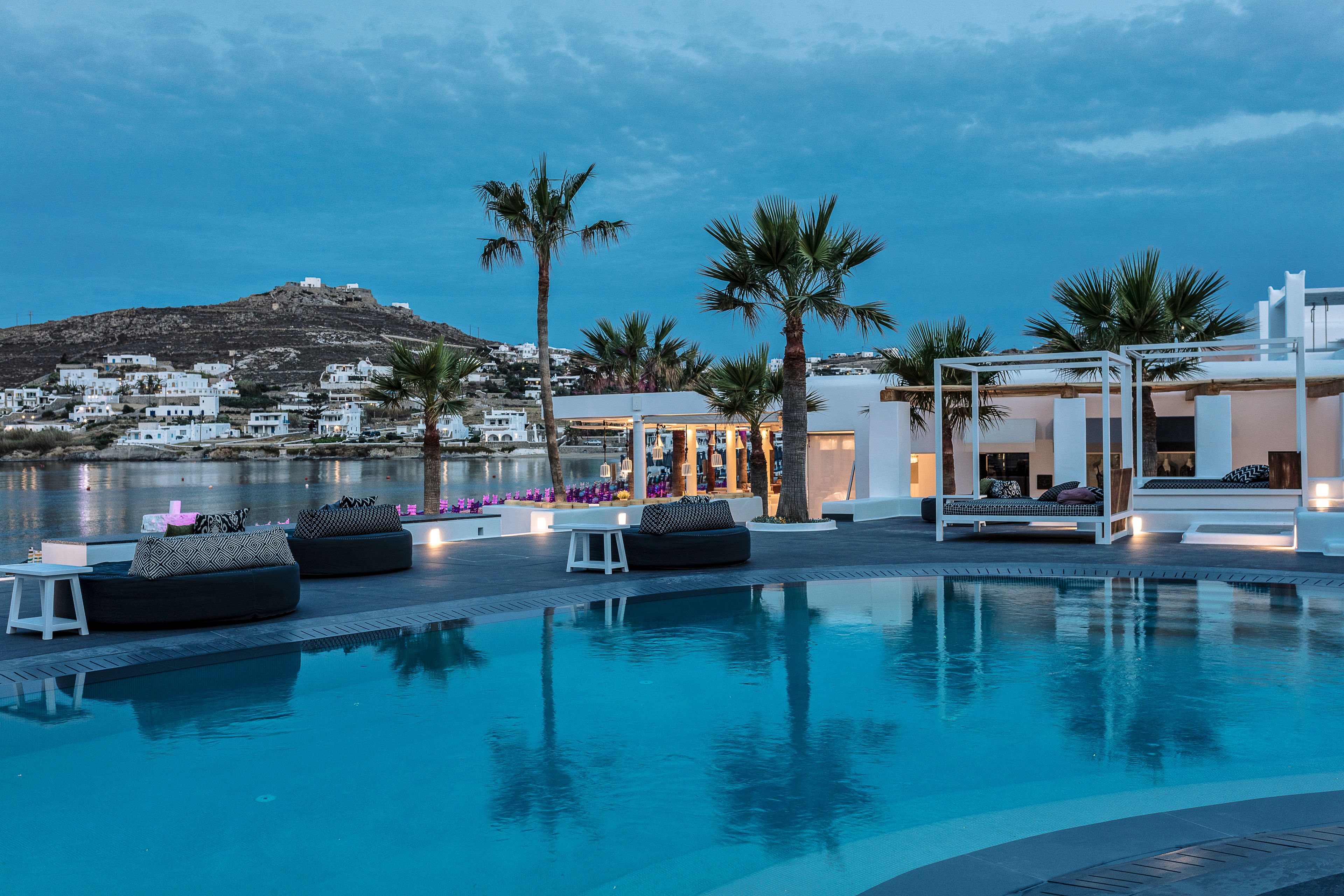 seasonal outdoor pool, pool umbrellas, pool loungers